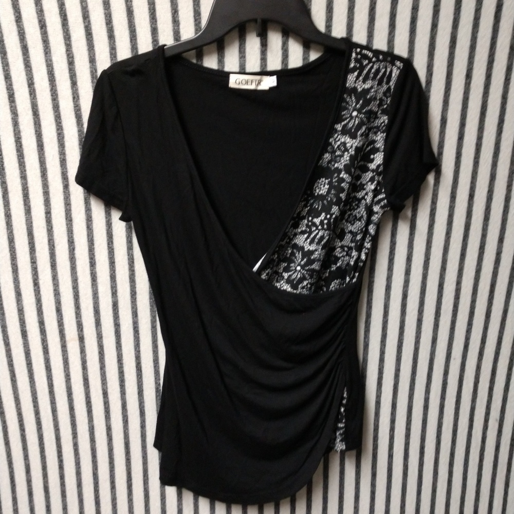 Black and white wrap blouse